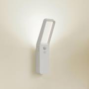 Lindby LED-vägglampa Taska, vit, plast, sensor