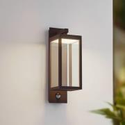 Lucande LED-utomhusvägglampa Ferdinand, rost, sensor, IP54