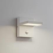 Lucande LED-utomhusvägglampa Silvan, vit, sensor, IP54, 16cm