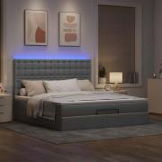 vidaXL Ottoman sängram med madrass ljusgrå 180x200 cm tyg