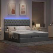 vidaXL Ottoman sängram med madrass ljusgrå 160x200 cm tyg