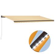 vidaXL Markis manuellt infällbar med LED 600x300 cm gul och vit