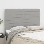 vidaXL Sänggavel ljusgrå 144x5x118/128 cm tyg