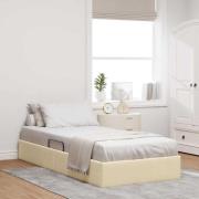 vidaXL Förvaringssäng med huvudgavel med lagring Kräm 90 x 200 cm tyg