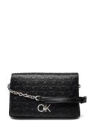 Calvin Klein Re-Lock Shoulder Bag Md - Emb Svart