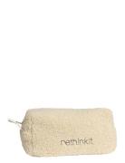 Rethinkit Turnable Purse Fuzzy Beige