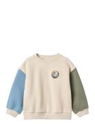 Wheat Sweatshirt L/S Badge Elliot Kräm