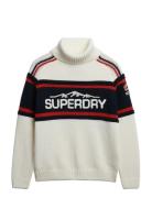 Superdry Sport Apres Ski Roll Neck Jumper Kräm